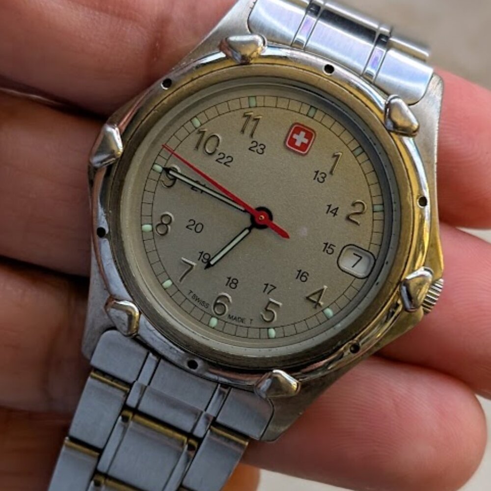 SWISS GRAY FACE WOMENS WATCH W/ DATE/24 HOUR/ GLOW IN DARK/100M